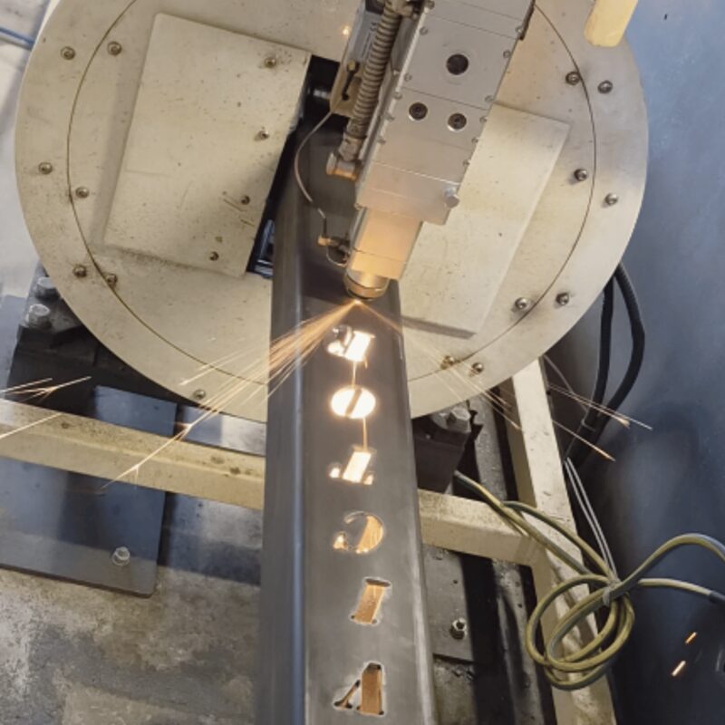 Row of cut-outs laser cut along a hollow steel section