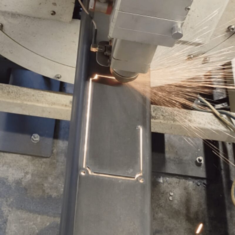 Rectangular access cut-out laser cut in a hollow steel section